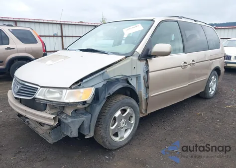 1999 Honda Odyssey Ex z USA, uszkodzony, nr VIN 2HKRL1864XH504660